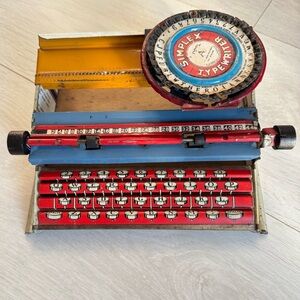 Vintage Typewriter Practical Simplex No 300 Child's Red and Yellow Tin Metal Toy